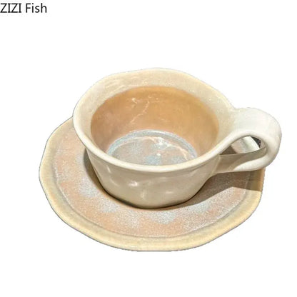 Cream-colored decorbites kiln porcelain cup and saucer with subtle textured glaze and soft rounded edges for dining room use