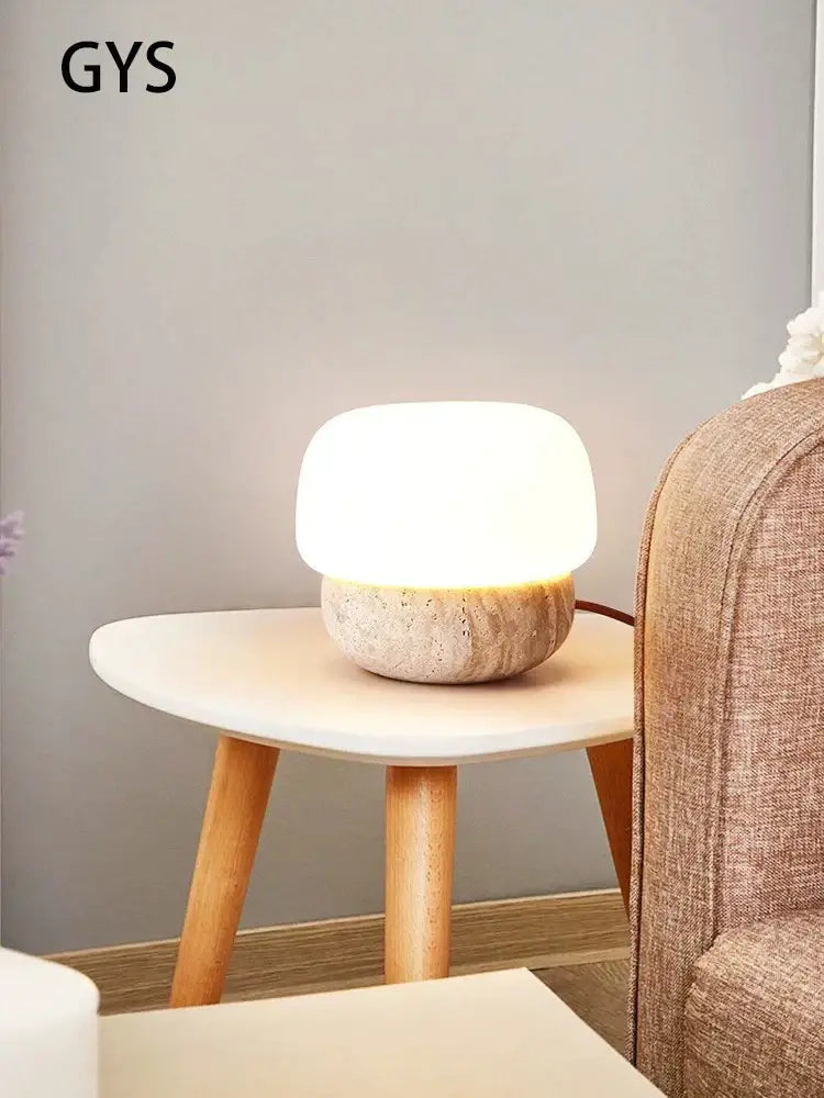 Soft glowing cream mushroom table lamp with textured stone base from decorbites for bedroom decor