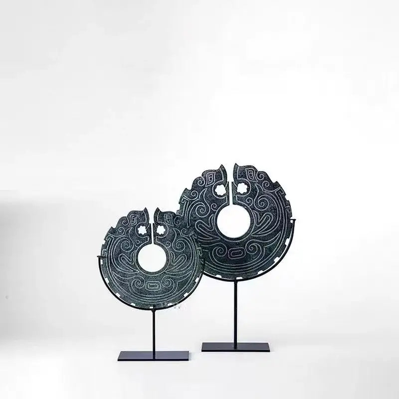 Two dark green jade bi discs with intricate carvings on black stands for decorbites geometric totem resin statue decor