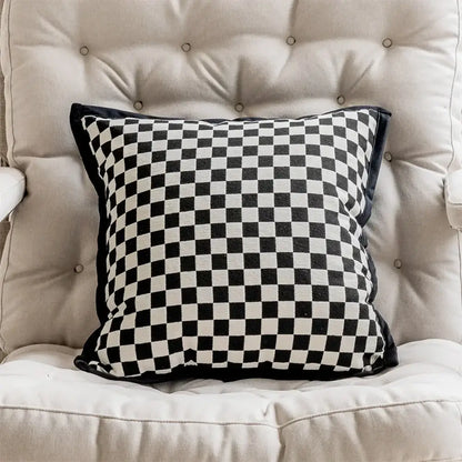 Black and white checkered throw pillow cover with black velvet trim complementing retro dark green embroidered jacquard luxury pillow