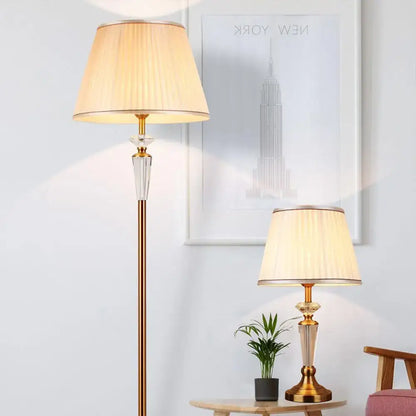 Retro emerald green and gold crystal floor lamp with a gold metal base and off-white pleated shade for bedroom decorbites decor