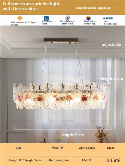 Retro French floral glass dining room chandelier with gold and green circular design featuring clear and amber glass panels