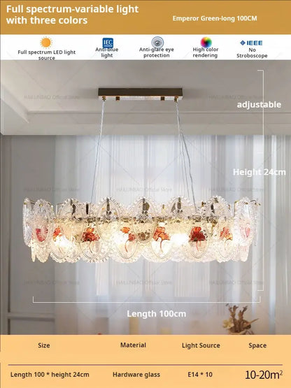 A retro french floral glass dining room chandelier with gold and green glass panels and warm decorbites glass dining lighting