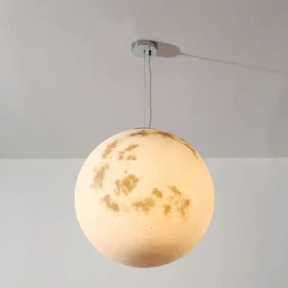Retro full moon chandelier pendant light with glowing detailed craters and warm off-white surface for modern home