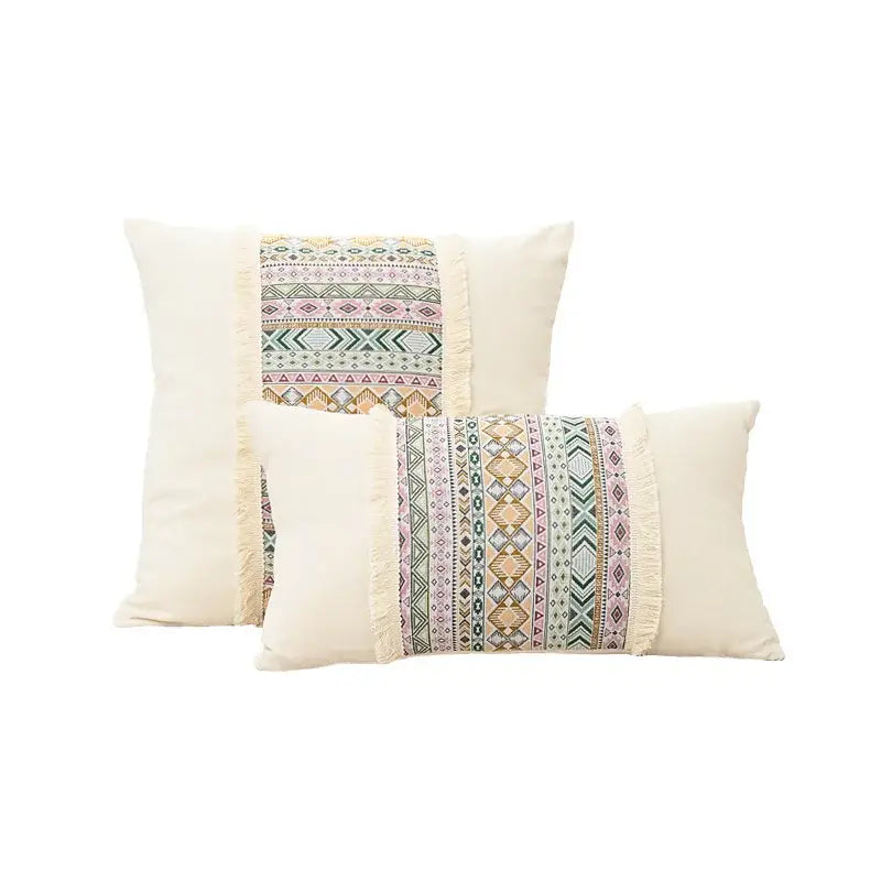 Cream-colored retro geometric cushion cover with pastel embroidery and decorbites handmade tassel detailing for living room decor