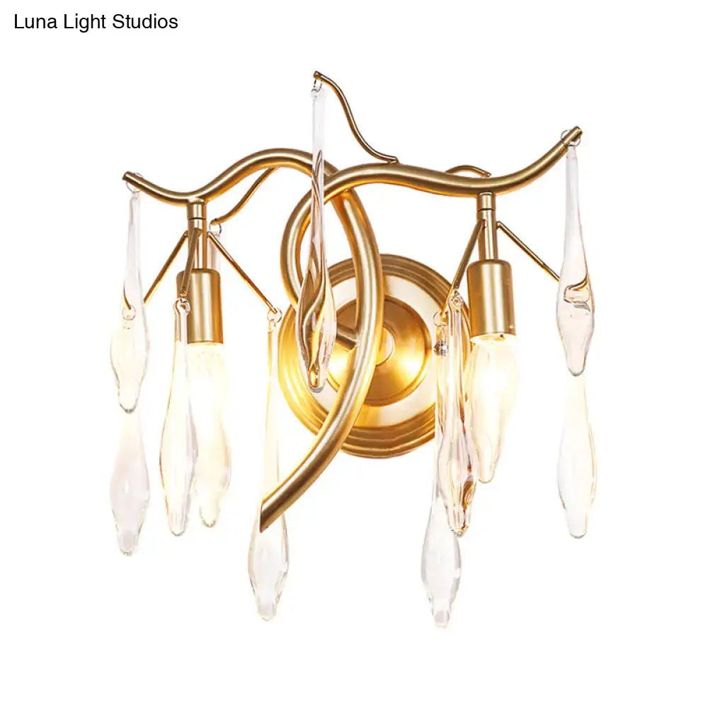 Gold-toned wall lamp with curved metal arms and clear crystal droplets for retro gold raindrop wall mount lighting