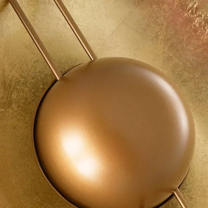 Retro gold round villa wall lamp featuring a matte gold spherical pendant with slender vertical rods for bedroom decorbites wall lamp