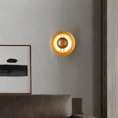Retro gold round villa wall lamp with gold-toned circular design and warm glowing light for bedroom decorbites gold round wall lamp
