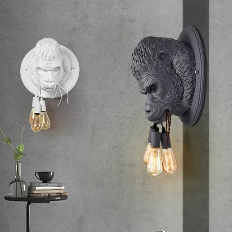Black gorilla head wall lamp with textured fur and three filament bulbs decorbites gorilla resin wall lighting
