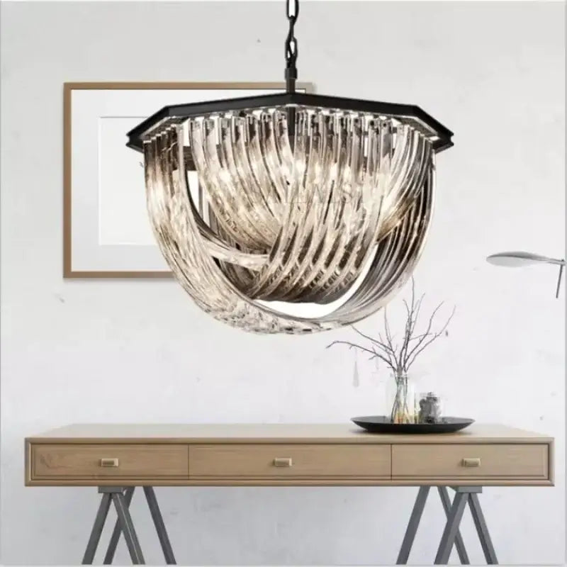 A modern retro hexagonal black metal e14 chandelier with cascading amber glass prisms pendant lights by decorbites