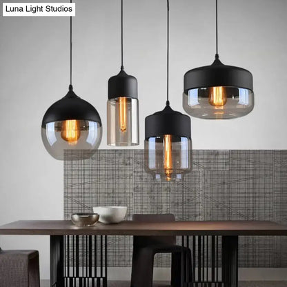 Set of three decorbites™ light pendant lighting with black metal tops and smoked glass shades in retro industrial style