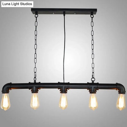 Black metal tubular island pendant light with four exposed bulbs in retro industrial style for dining room