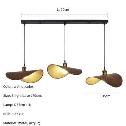 Modern three-light pendant light with walnut wooden shades and metallic accents for dining room decorbites hat pendant