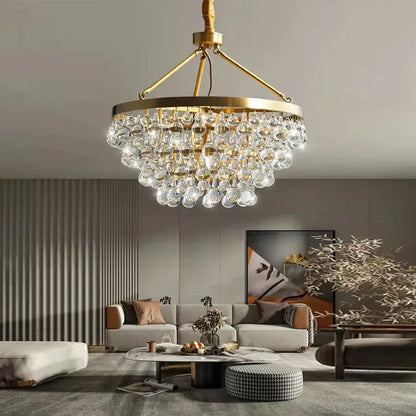 A luxurious retro gold pendant light with clear decorbites crystal bead droplets for elegant dining room decor