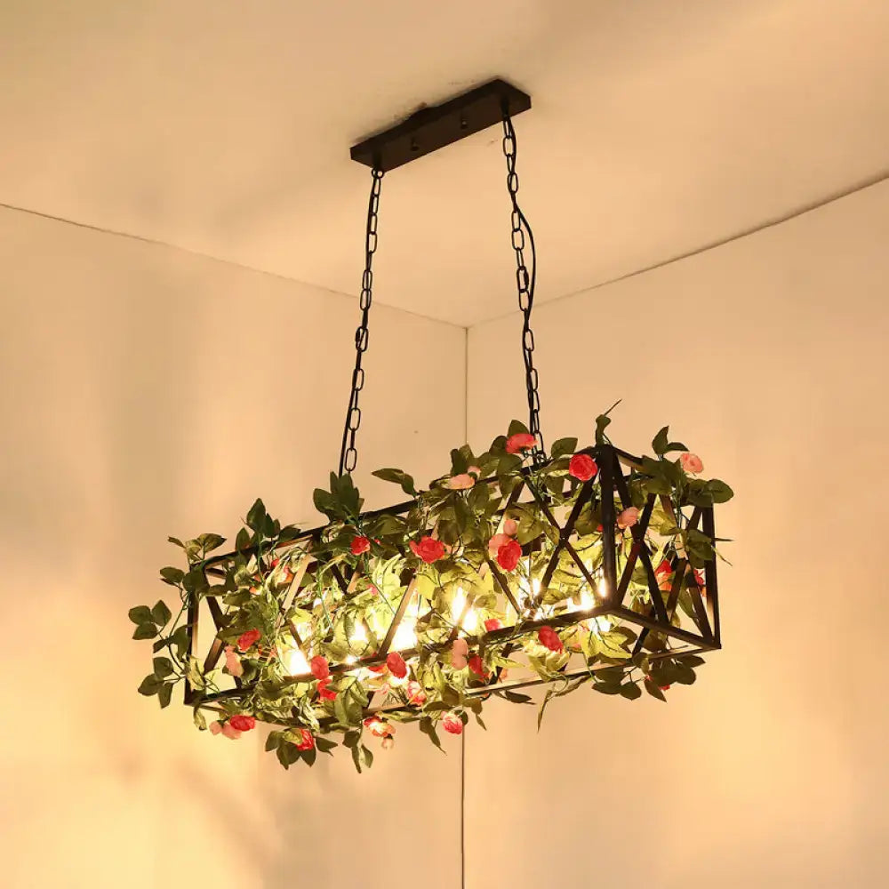 Decorbites™ black retro metal pendant light with geometric design, artificial vines, pink roses, and warm glowing lights