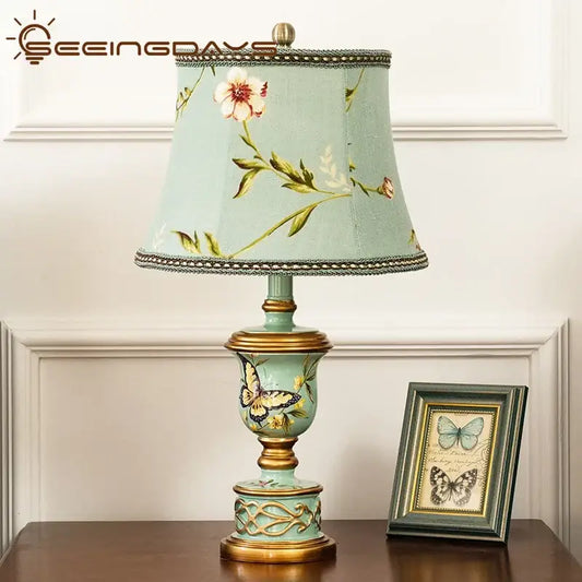 Retro mint green resin table lamp with gold accents and hand-painted butterflies for elegant bedroom decorbites green resin decor
