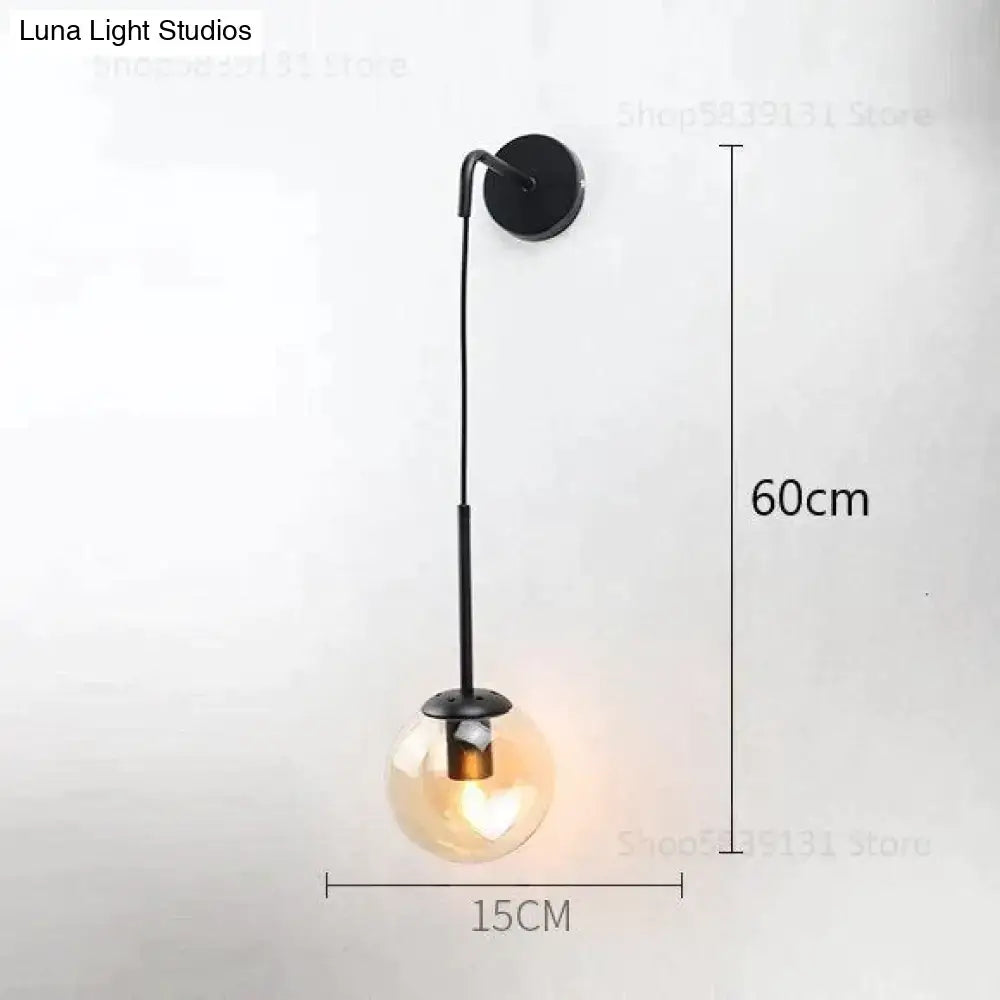 Black metal wall lamp with retro modern glass smoked globe bulb ideal for nordic bedroom lighting