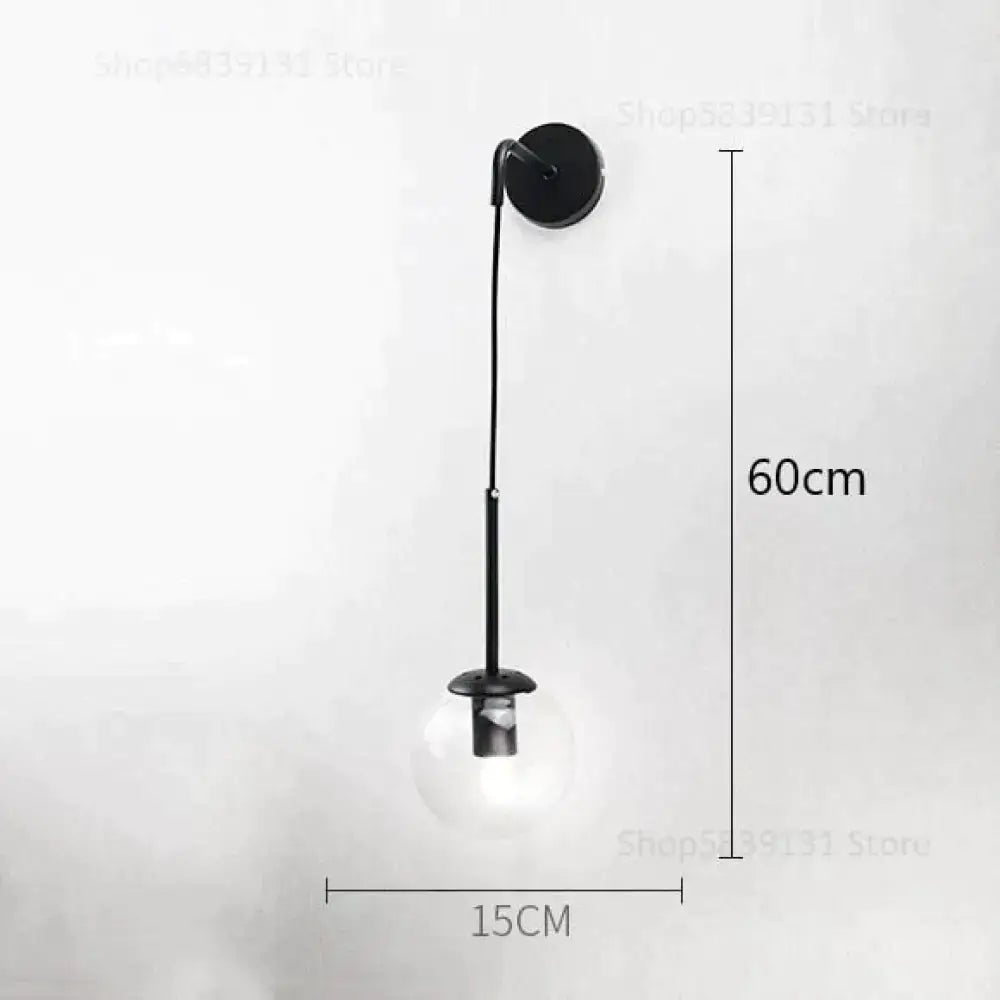 Black metal wall lamp with clear glass globe bulb for nordic retro modern bedroom lighting
