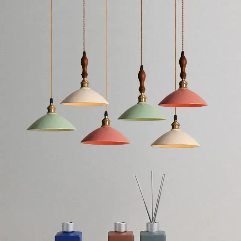 Retro pastel ceramic and brass chandelier light with wooden finials as decorbites brass chandelier for dining rooms