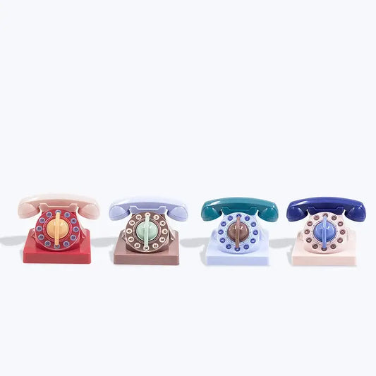 Four pastel and vibrant retro mechanical telephone kitchen timers with matching bases for decorbites cute telephone use