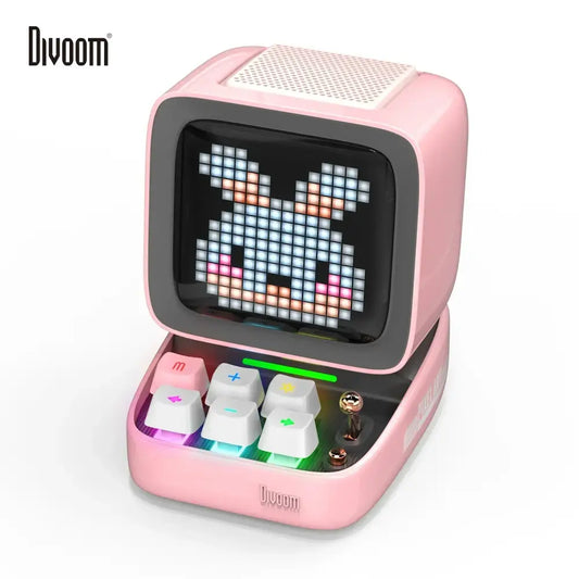 Retro pink pixel art alarm clock speaker with pixelated rabbit display and colorful illuminated keys for bedroom decor