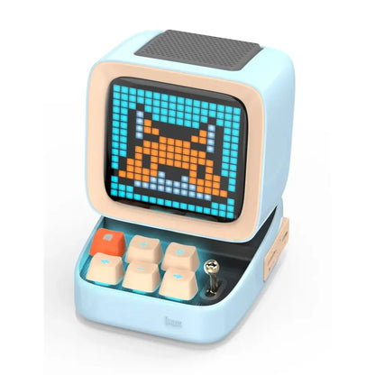 Light blue retro pixel art bluetooth speaker shaped like a computer with led display board and beige keys for bedroom use