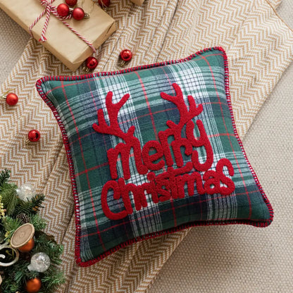 Festive green and red plaid pillow case with embroidered reindeer antlers and merry christmas text for living room