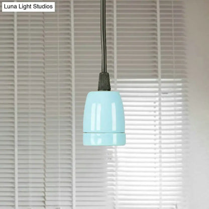 Decorbites™ retro style mini pendant light with sleek light blue ceramic shade and black cord for ceiling use
