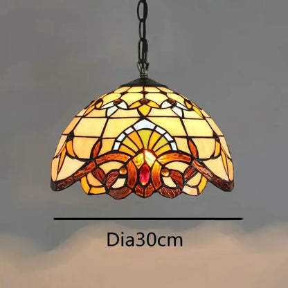 A warm-toned retro tiffany style colorful glass chandelier pendant lamp with floral and geometric patterns for dining room decorbites colorful glass