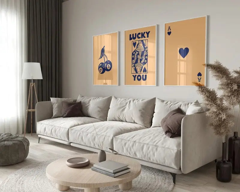 Beige sectional sofa with dark brown throw pillows beside DecorBites wall art posters retro wall art queen of hearts theme