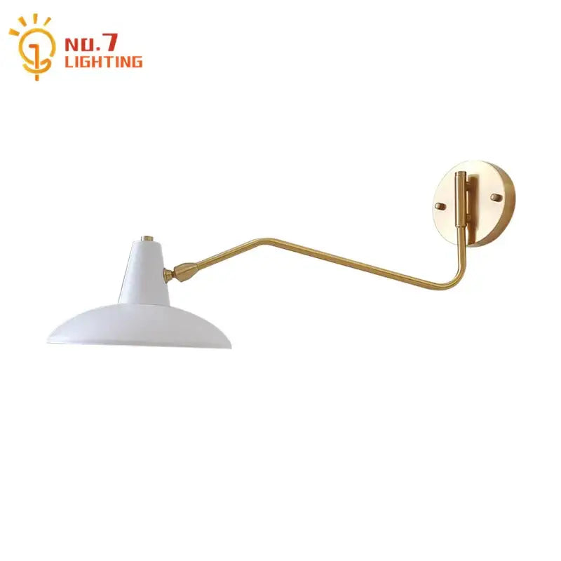 A sleek white conical shade wall lamp with gold swing arm and circular wall plate for bedroom reading light decorbites copper swing
