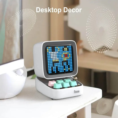 Retro white pixel art bluetooth speaker alarm clock with led display board and colorful mint green and pink keycaps