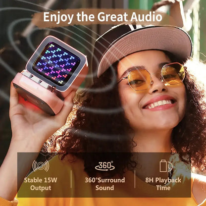 Pink retro-style portable bluetooth speaker alarm clock with pixel art led display board and black accents for bedroom use