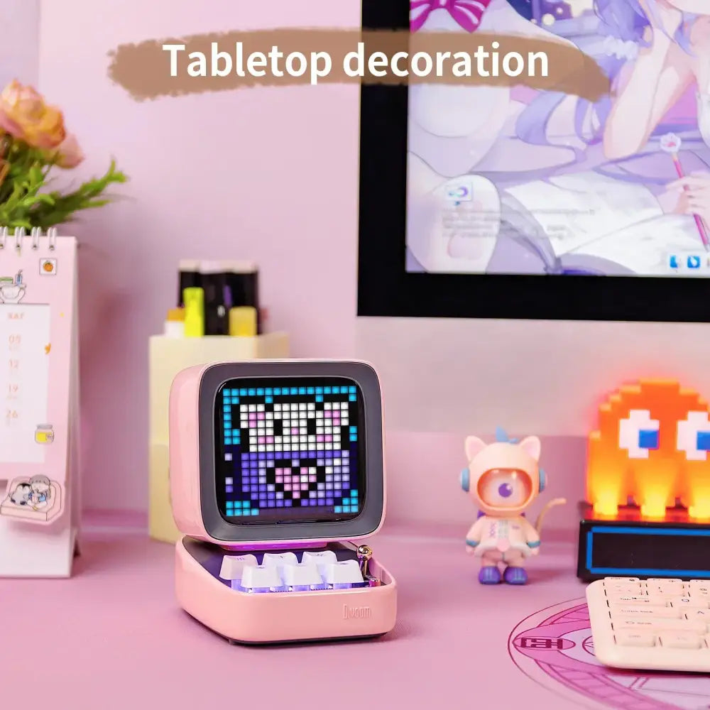 Pink retro-style pixel art bluetooth speaker alarm clock with led display board and colorful square screen patterns