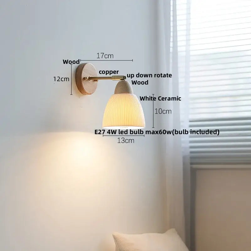 A warm-toned ribbed ceramic and wood wall sconce light with a copper arm, ideal as bedroom sconce light fixture