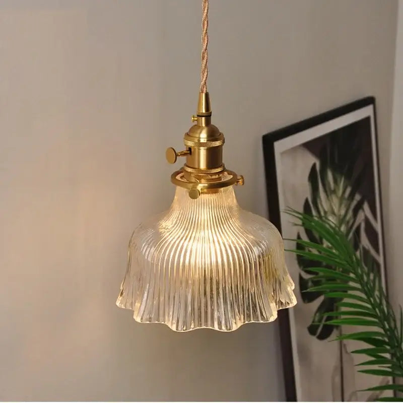 Vintage-style pendant light with brass-finished metal fixture and clear ribbed glass led shade for dining room decorbites clear glass