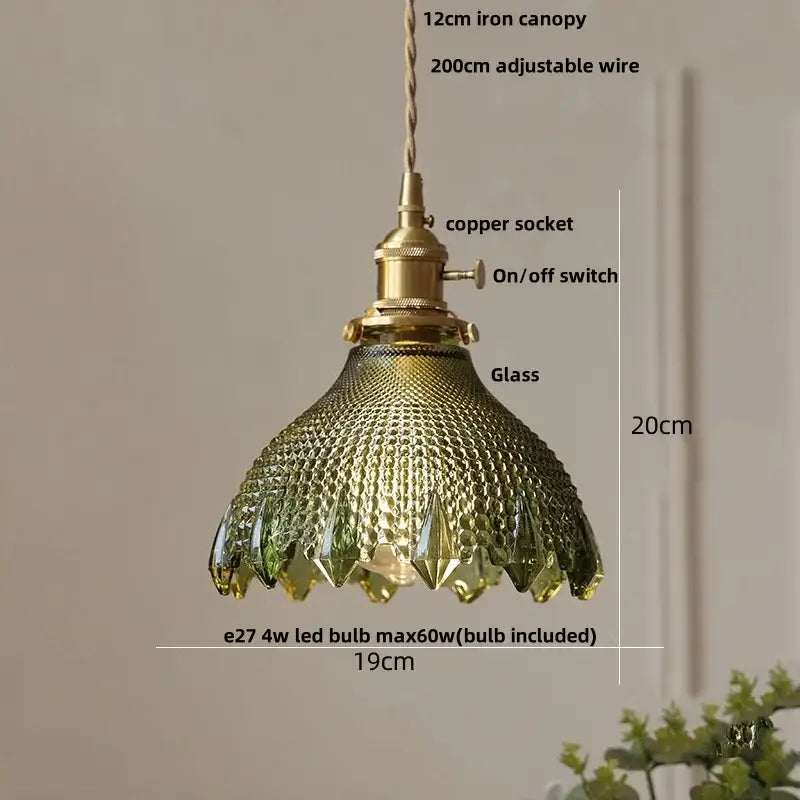 Vintage-style pendant light with ribbed emerald green glass shade and brass finish featuring decorbites clear glass led design