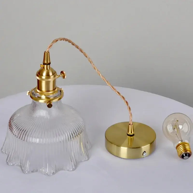 Ribbed clear glass led pendant light with brass fixture and twisted copper cord for dining room decorbites clear glass