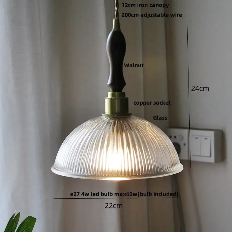 Ribbed clear glass led pendant light with brass accents and dark walnut iron canopy for dining room decorbites clear glass