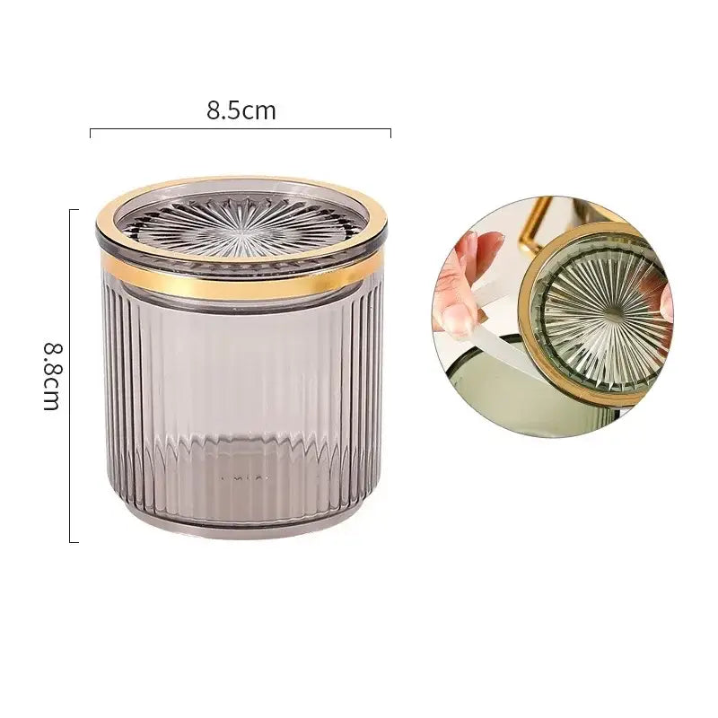 A sleek translucent gray ribbed acrylic seasoning jar with gold sunburst lid from decorbites acrylic seasoning jar set