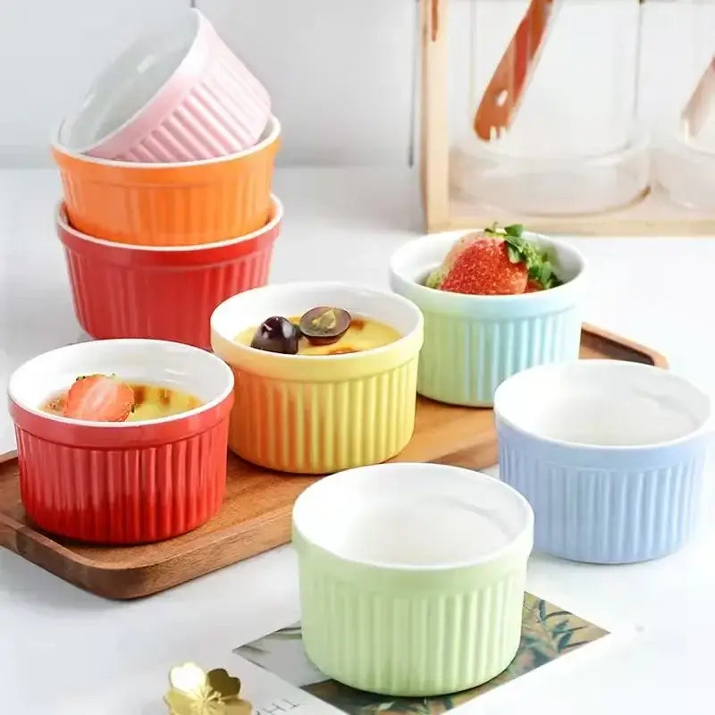 Set of ribbed colorful ceramic baking bowls in pastel and vibrant hues perfect for individual dessert serving