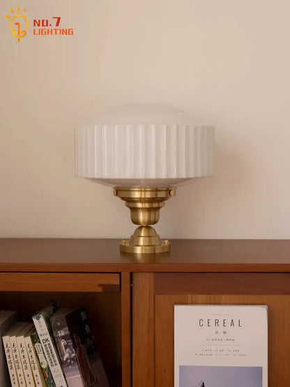 White ribbed glass pendant light with brass base displayed on wooden shelf for dining room decorbites brass glass pendant