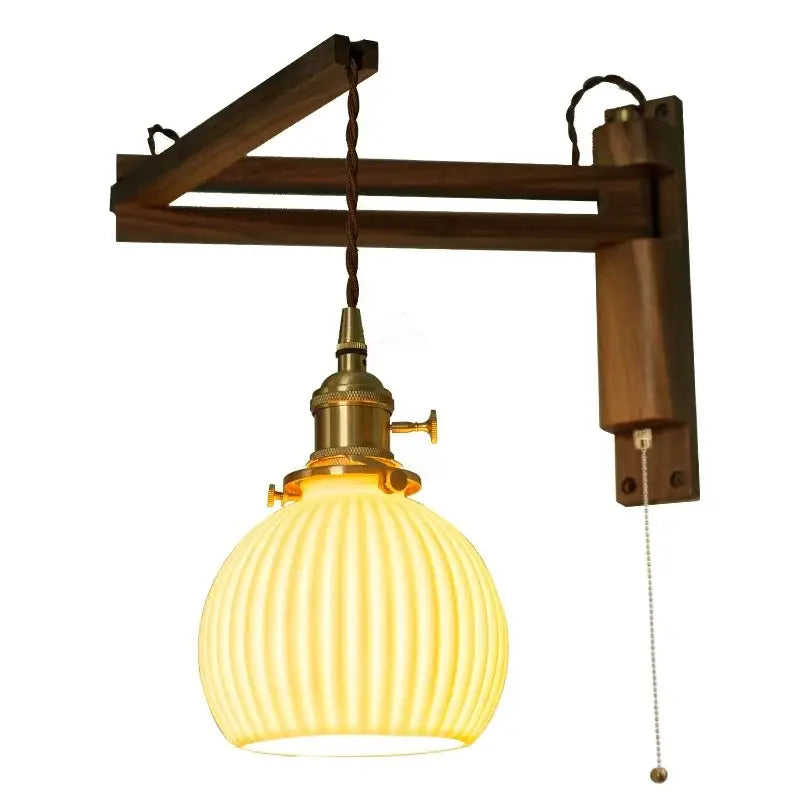 Warm yellow ribbed glass wall sconce with brass fittings and walnut arm for decorbites ceramic led wall lighting