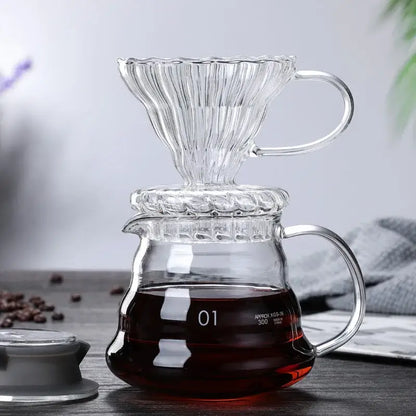 Clear glass ribbed coffee maker pot with fluted cone filter and wood lid for precise coffee brewing up to 300ml capacity