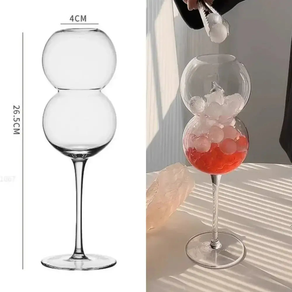 Clear glass double-globed cocktail goblet with slender stem and round base from decorbites heart love glass mugs collection