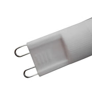 White decorbites g9 led bulb with ribbed texture and metallic contacts for warm white living space lighting
