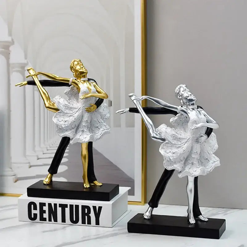 Golden and silver dancing couple sculpture with white lace dresses and black pants on sleek black bases for decorbites decor