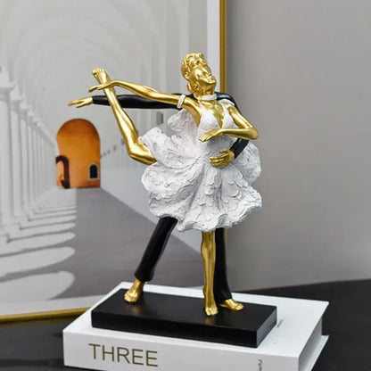 Golden and white ballet dancer figurine with intricate detailing on black base for decorbites dancing couple sculpture