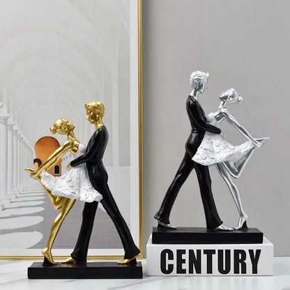 Golden and black resin dancing couple sculpture in formal attire perfect for living room decorbites dancing couple decor