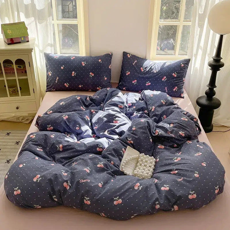 Navy blue cherry patterned quilt bedding set with white polka dots and cherry embroidery from decorbites cotton flower print collection